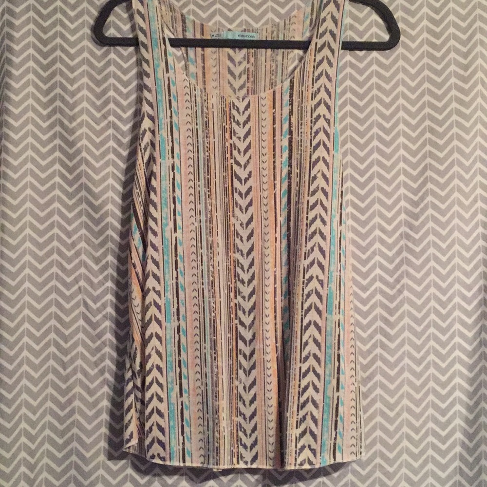 Maurice’s tank top